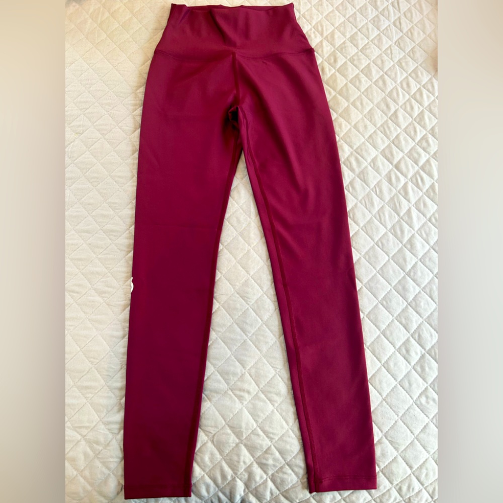 NWT Peloton “Together we go far” flex legging. Merlot color. Butter fabric